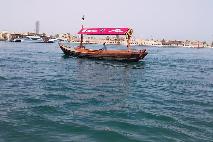 Experience the charm of Dubai as you glide across the water on a traditional boat soaking in stunning views of the city’s iconic landmarks and rich heritage.